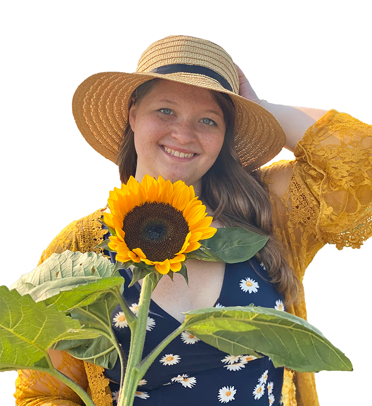 Hannah holding a sunflower